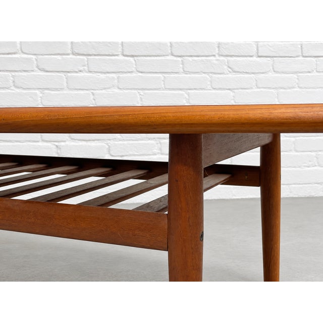 Coffee Mid Century Modern Coffee Table by Grete Jalk, C. 1960’s | Upturned Edges & Slatted Magazine Rack For Sale - Image 8 of 13