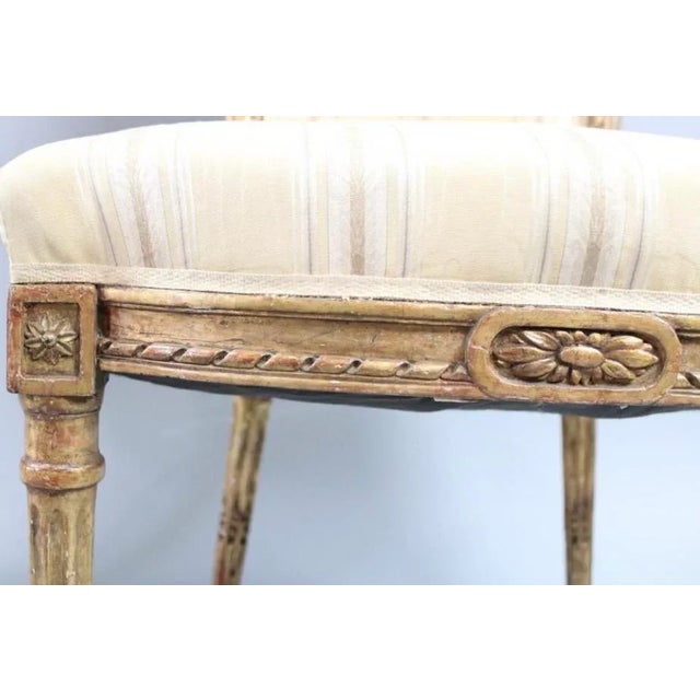 Pair of 19th Century Louis XVI Matching Gilt Wood and Painted Side Chairs in Striped Fabric For Sale - Image 4 of 13