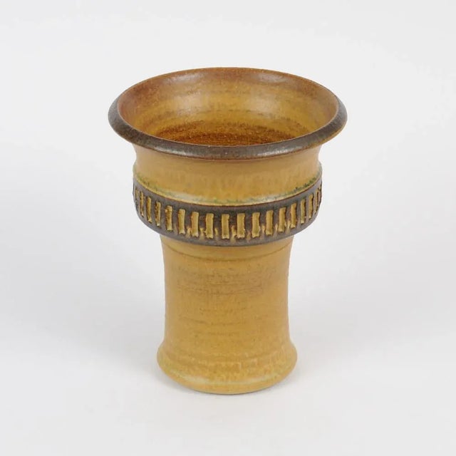 This is a Soholm ceramic vase designed by Joseph Simon. It was made in the 1960s in Denmark. This piece has an attribution...