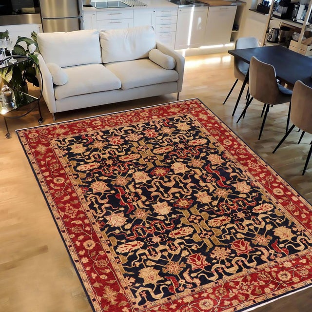 "Enhance the ambiance of your home with this magnificent Persian-influenced Turkish hand-knotted rug made by skilled...