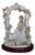 Lladró Tranquility (Model #06677) Porcelain Figurine, Featuring a Seated Woman Under a Floral Arbor For Sale