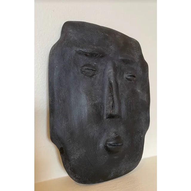 Small Plaster Mask Sculpture made by Chicago artist Matthew Weil. Metal Hanger glued to the back, perfect for hanging on a...