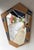 Contemporary Asymmetrical shape wall mirror in nice rattan wicker bamboo marquetry with enamel metal decor. Contemporary...