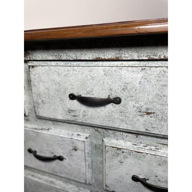 Very good quality solid wood commode with a painted and gently distressed finish. A heavy, well-made vintage piece...