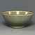 This antique Chinese Longquan celadon bowl has a classic rounded shape. The surface is covered with natural crackled glaze...