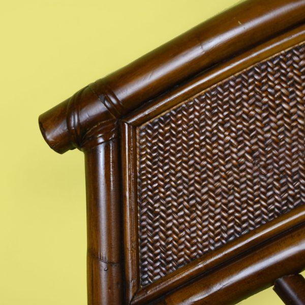 A fretwork rattan king headboard, its open geometric fretwork spreading across a grand eighty-one-inch width. The woven...