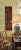 Add global character and a sense of adventure to your space with this richly hand carved wooden wall panel featuring a...