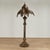 Exotic antique Moroccan floor lamp crafted in brass and copper perforated in geometric designs featuring a crescent moon...