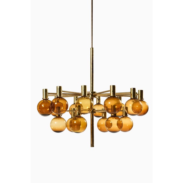 Large ceiling lamp in brass and amber glass by hans-agne jakobsson, 1950's additional information: material: brass and...