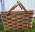 I have several double decker picnic baskets available- this is the one with hinges and the shelf with attached feet....