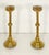 A fine pair of English altar candlesticks or mantlepiece candleholders of solid brass in the Gothic Revival style - each...