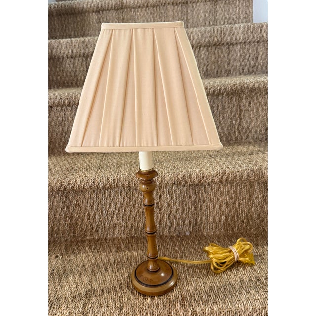 Hand painted faux bamboo painted table lamp in the style of Colefax and Fowler. Includes silk shade with shell pink...