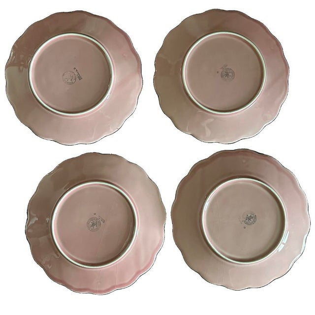 Vintage “Ingrid Pink” dinner plate set by Bordallo Pinheiro. Embossed floral, fern and raised dot pattern with a scalloped...