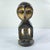 A hand-carved Lega figure originates from the Lega people in the Democratic Republic of the Congo. The figure is easily...