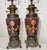 This rare pair of antique 19th century Hinks & Sons Duplex electrified bronze mounted porcelain oil lamps are a unique and...
