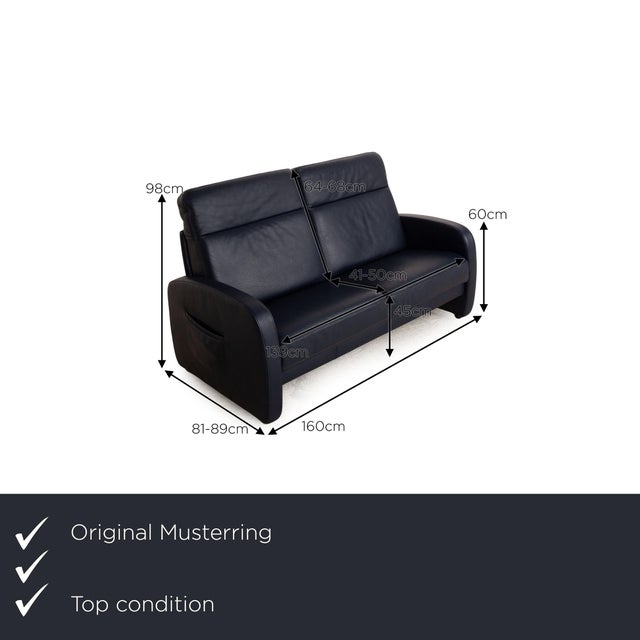 The Musterring sofa is covered with dark blue genuine leather and stands on floor-to-ceiling side panels. The classic...