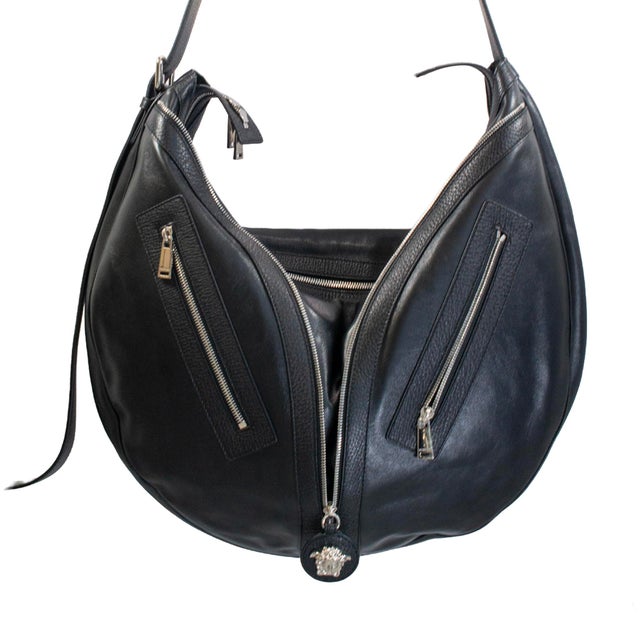 Brand: Versace&nbsp; Gender: Ladies Height: 16.00 inches Width: 4.00 inches Length: 23.00 inches Weight: 1,210.00 grams...