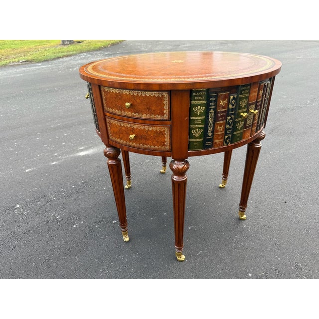 Beautiful maitland smith side table with embossed leather top and bound faux books.