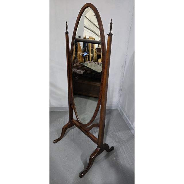 A very good quality Edwardian mahogany cheval mirror with oval bevelled plate glass, in excellent overall condition. 57"...