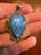 Beautiful blue labradorite and sterling silver pendant with sterling flourished edge.