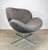 A large and comfortable swivel lounge chair from BoConcept, Denmark. Fabric is a coarse tweed weave of white, brown and...
