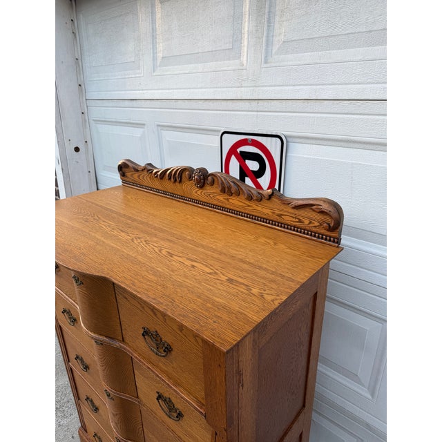 Antique Victorian Oak Serpentine Front Five-Drawer Highboy Dresser With Ornate Carved Crest For Sale - Image 9 of 12