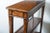 Narrow Console with two drawers. Carved details on drawer fronts. Distressed finish'