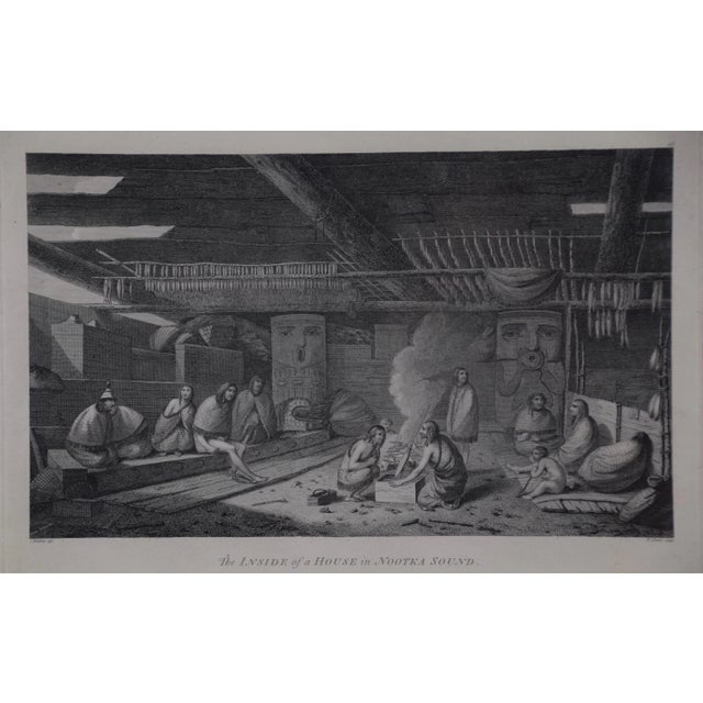 "The Inside of a House in Nootka Sound" is an engraving created by William Sharp (1749-1824), from a drawing by John...