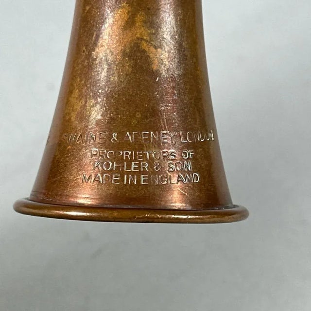 Antique English brass and copper equestrian fox hunting horn by Swaine & Adeney, London. Stamped "Swaine & Adeney London...