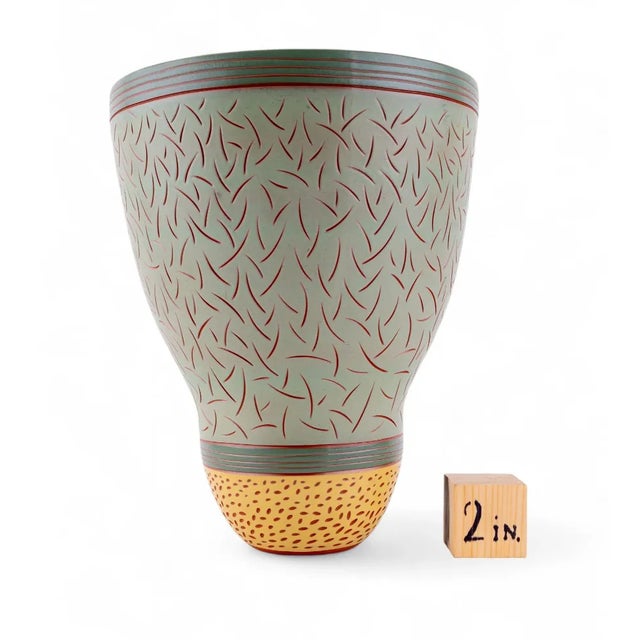 Beautiful large pale green and yellow glazed terracotta vase with incised marks using the sgraffito technique of etching...