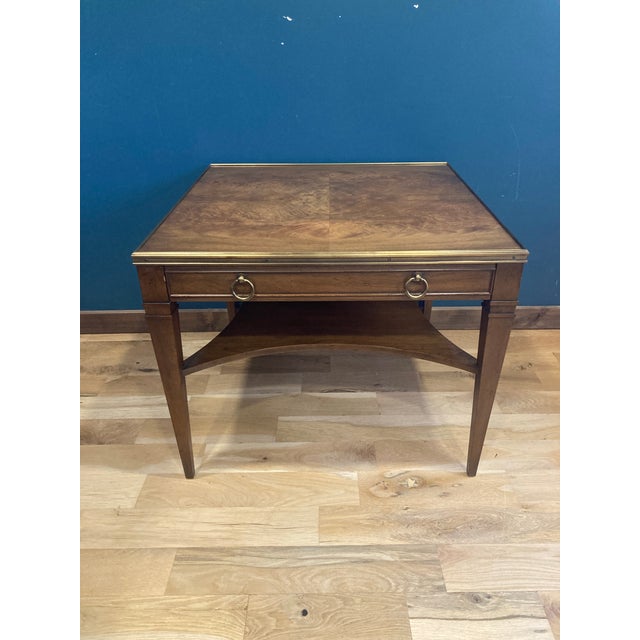 his exceptional 1950s side table by Baker Furniture blends neoclassical design with midcentury refinement. Crafted with...