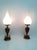 Made in Italy, 1950s. These table lamps have a red varnished metal and brass base and an opaline glass shade. They are...