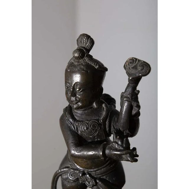 Chinese Ming Dynasty Bronze Taoist Figure, 16th Century, in Flawless conditions. Designed before 1890