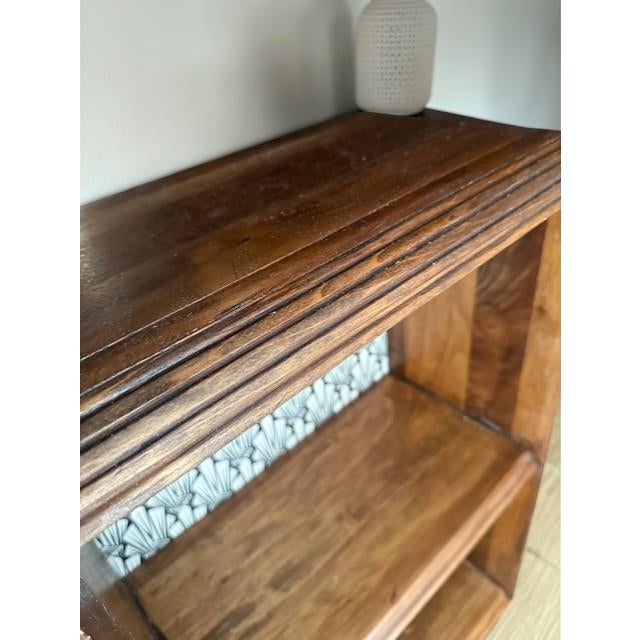 This beautifully restored solid walnut bookcase, dating to the 1930s–1940s, is a charming example of early 20th-century...