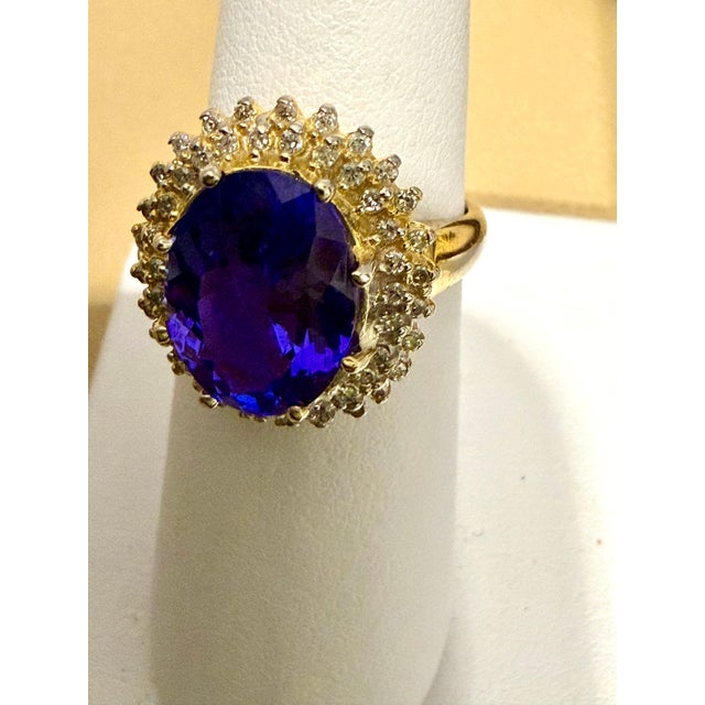 Metal 6.2 Carat Oval Tanzanite & 1 Ct Diamond Ring 14 Karat Yellow Gold, Estate, S 7 For Sale - Image 7 of 8