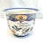 This vintage chinoiserie planter features blue floral decoration, bird imagery, and metallic detailing that give it a...