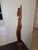 An extraordinary mid-century Balinese modernist sculpture depicting a stylized, statuesque maiden by the highly celebrated...