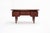 Solid teak legs with a teak-veneered top. The desk is in very good vintage condition and has been completely restored. All...