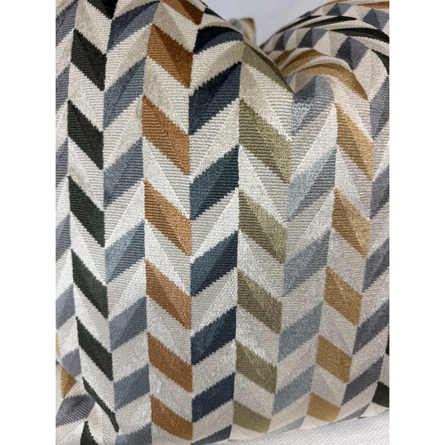 Custom pair of 22" pillows covered in Romo "Katori" in color tamarind. These pillows have tapered corners to prevent dog...