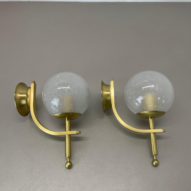 Article: Set of two Wall lights Origin: Italy Age: 1970s This set of two modernist wall lights was produced in Italy in...