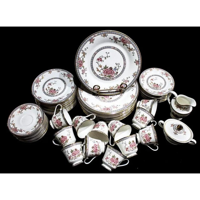 Royal Doulton china in the Canton pattern, service for 12 Includes: 12 each Dinner Plates 10 1/4", Salad Plates 8", Bread...