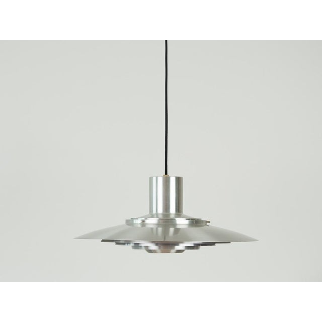 The P376 lamp was designed by Jørgen Kastholm and Preben Fabricius for Nordisk Solar Compagni in 1964. Kastholm and...