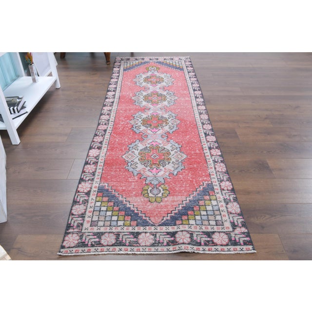 Vintage Turkish Hand-Knotted vintage rug is a semi-antique vintage area rug.'70s Eastern region of Turkey's unique rug is...