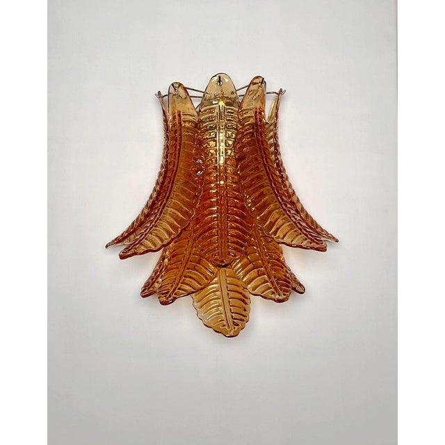 Fantastic pair of vintage Murano wall sconce made by 10 Murano amber Six-Tier Felci for each applique in a chrome metal...