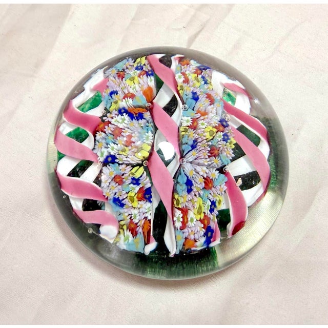 Up for sale is a lovely vintage hand blown Murano Italian art glass paperweight. It's blown by hand with a mix of vibrant...