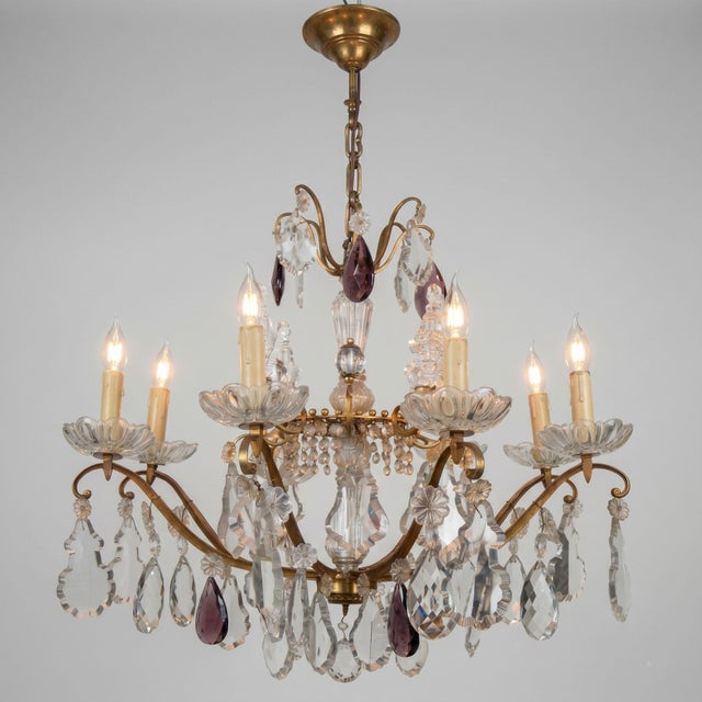 This imposing Louis XV style cage chandelier is distinguished by its generous size and the elegance of its bronze...