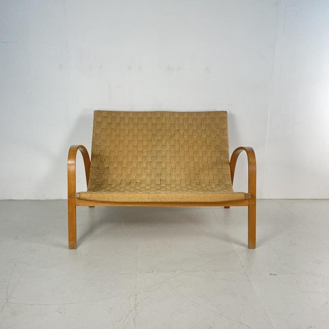 Mid Century Italian wood and chord 2 seater lounge bench / sofa purchased on a recent buying trip to Italy. In good...