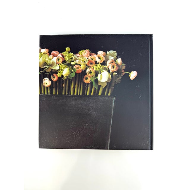 Nico De Swert: Living with Flowers" is a captivating exploration of floral design, showcased through the stunning...