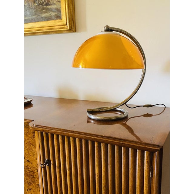 Space age yellow table lamp France, 1960s acrylic glass, metal H 45,5 cm - Diam. 35 cm Conditions: good consistent with...