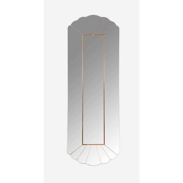 Ad008 mirror is a work realized by alain delon for maison jansen 1970s. Brass profiles, brass plate with production logo...